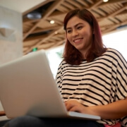 Asian Woman Using Laptop